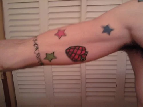 Billie Joe Multicolored Stars Tattoo