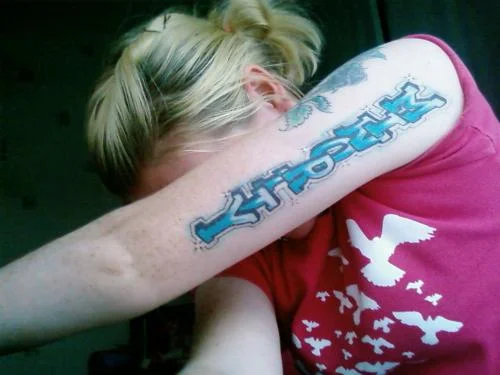 Green Day Minority Logo Tattoo
