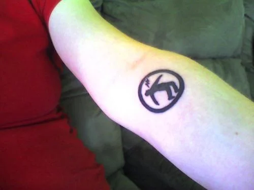 Warning Man Logo Tattoo