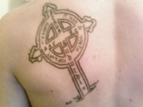 Celtic-Style Ring Cross Tattoo