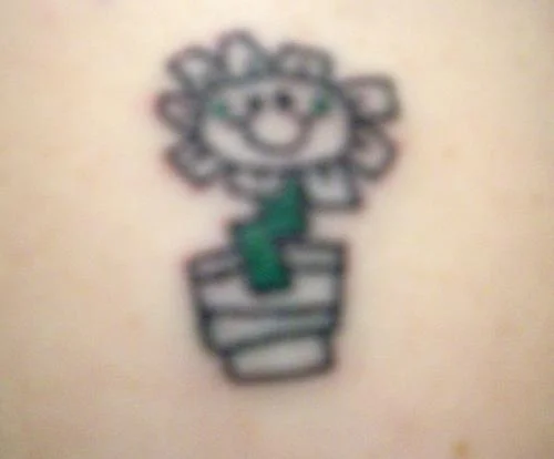 Green Day Logo and Kerplunk Flower Tattoo