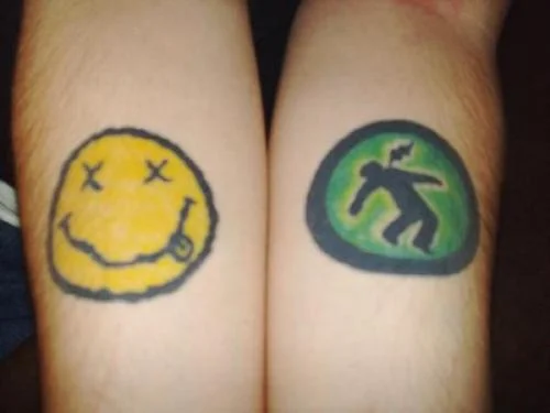 Warning Man Logo Tattoo
