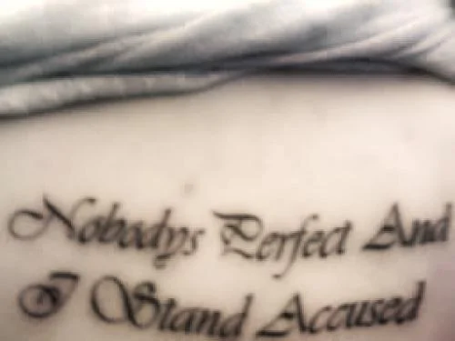Text: Nobodys Perfect and I Stand Accused Tattoo