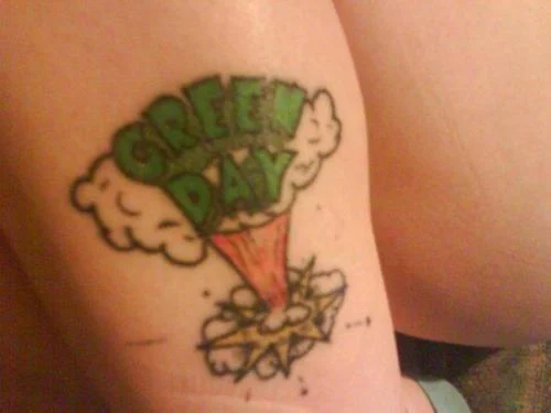 Dookie-Era Bomb Cloud with Green Day Logo Tattoo