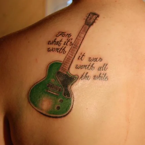 Green Electric Guitar with Script Text Tattoo