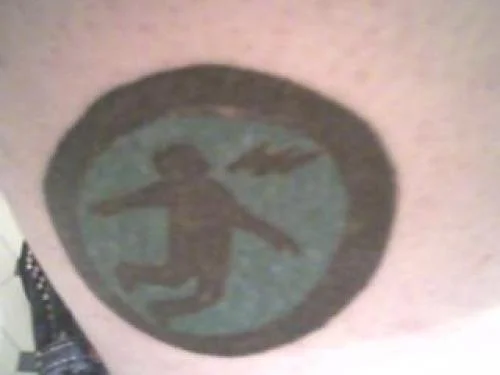 Warning Man Logo Tattoo
