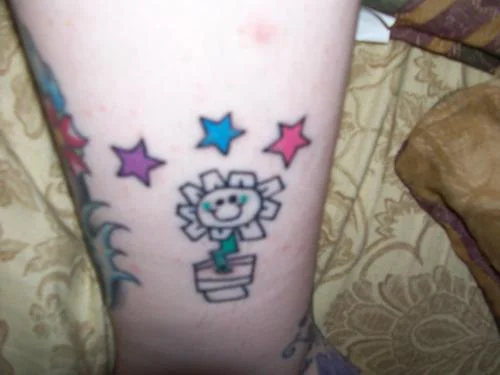 Billie Joe Multicolored Stars Tattoo