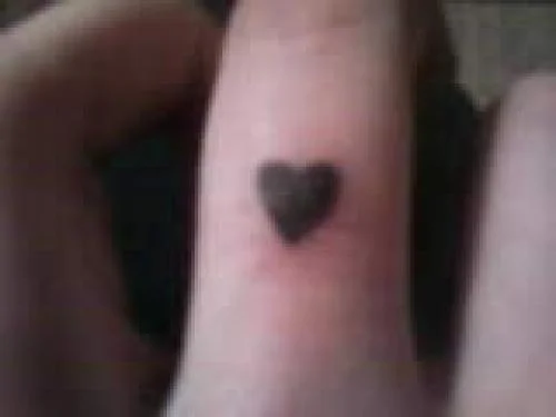 Billie Joe Finger Heart Tattoo