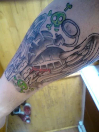 Winged American Idiot Heart Grenade with Green Skulls Tattoo