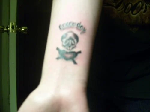 Green Day Skull and Crossbones Tattoo