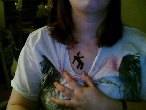 Warning Man Logo Tattoo