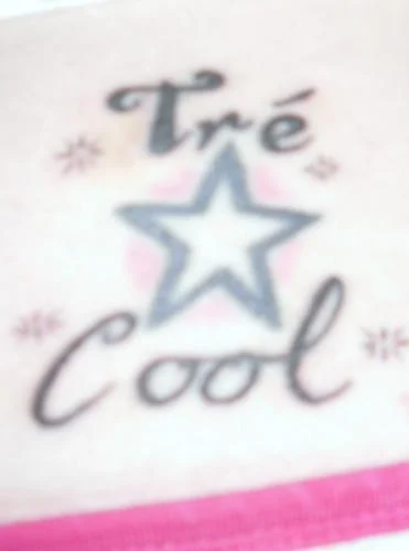 Tré Cool Name and Star Tattoo