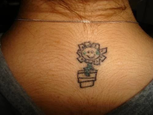 Green Day Logo and Kerplunk Flower Tattoo