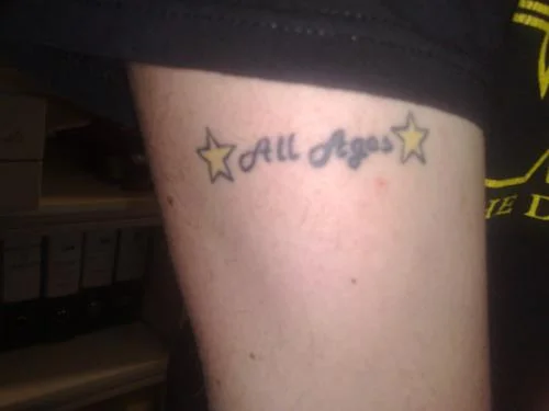 All Ages Script with Stars Tattoo