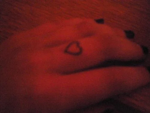 Small Heart Finger Tattoo