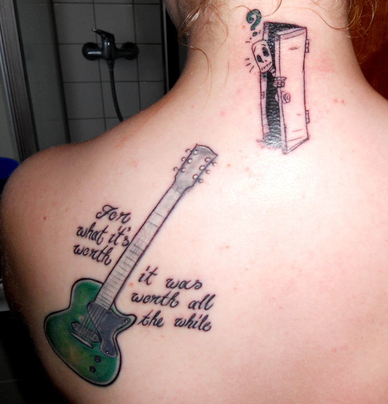 Green Guitar with Lyrics Tattoo