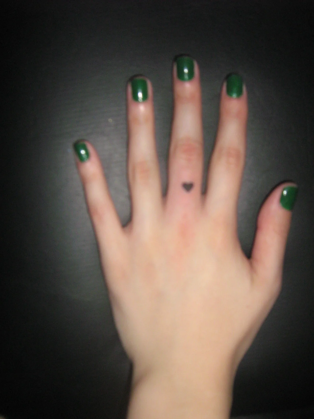 Heart on Finger Tattoo