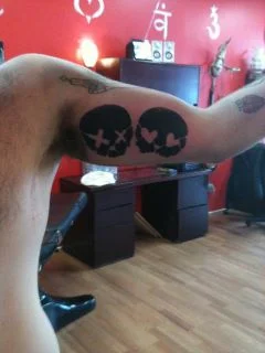 Skulls with Heart Eyes Tattoo