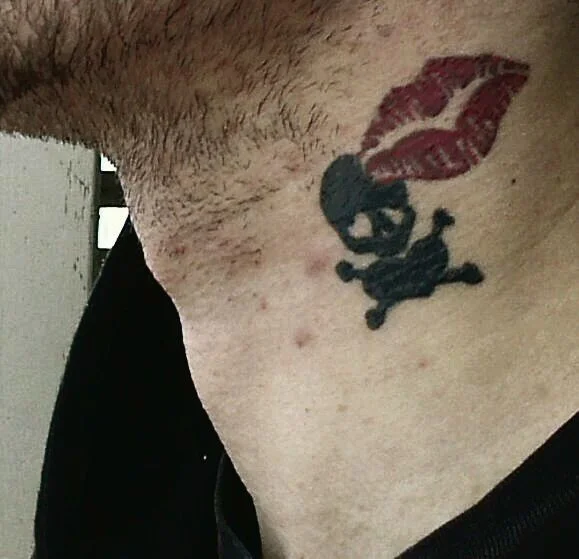 Heat and Skill Crossbones Tattoo