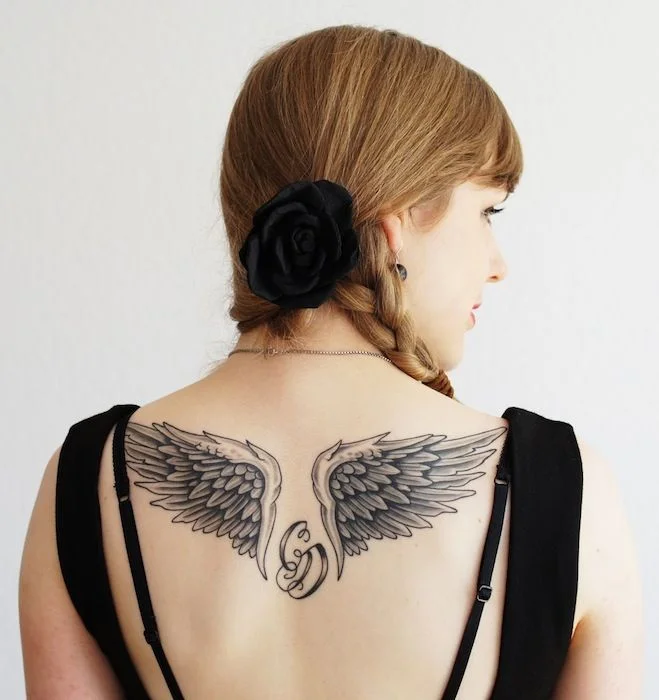Winged with Heart Design Tattoo