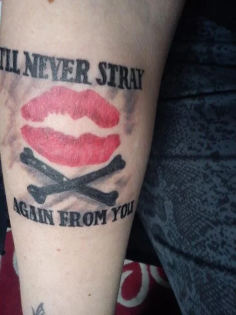 Kiss and Crossbones Tattoo