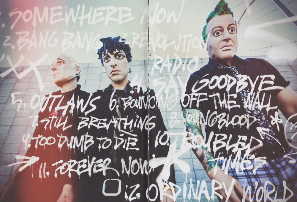 RevRad hardcover lyric book - page 2-3