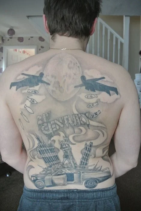 War Imagery Tattoo