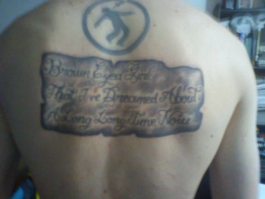 Warning Man Logo Tattoo