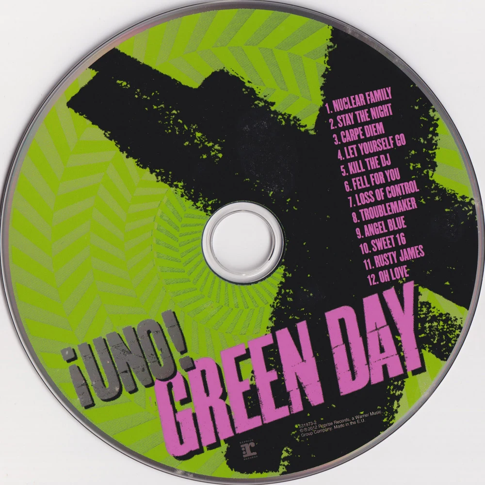 ¡Uno! hardcover lyric book - CD