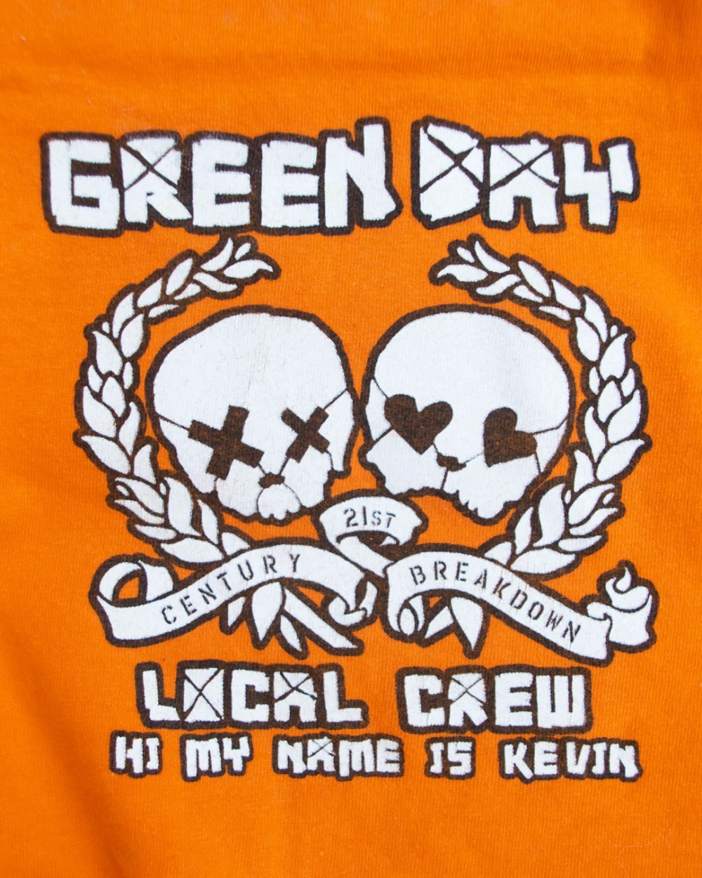 Orange 21st Century Breakdown local crew t-shirt - 'Hi my name is Kevin' - close-up