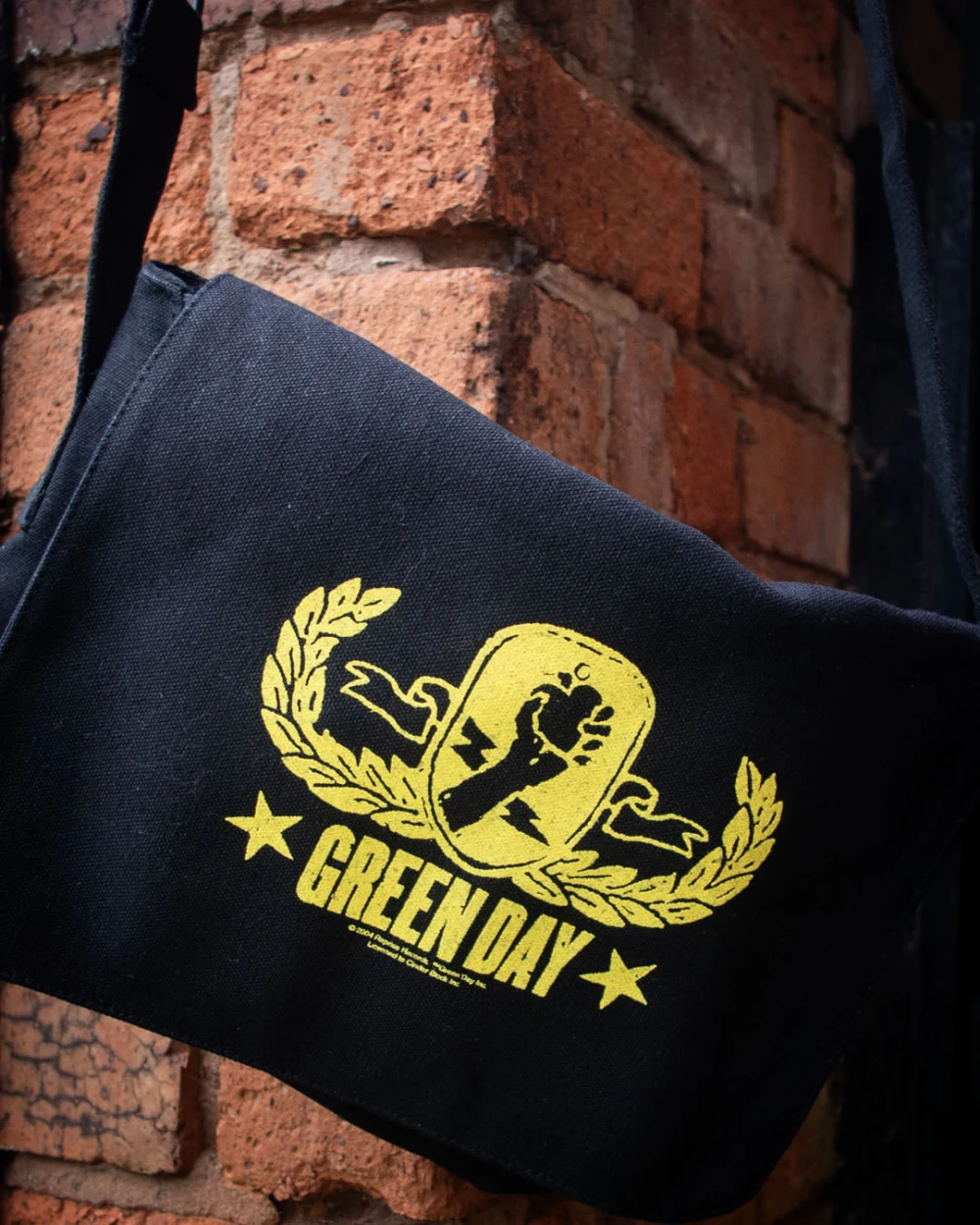 Black and yellow American Idiot messenger bag