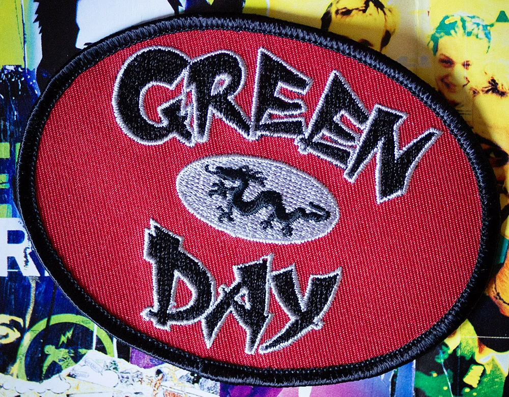 Red, black and silver dragon logo patch